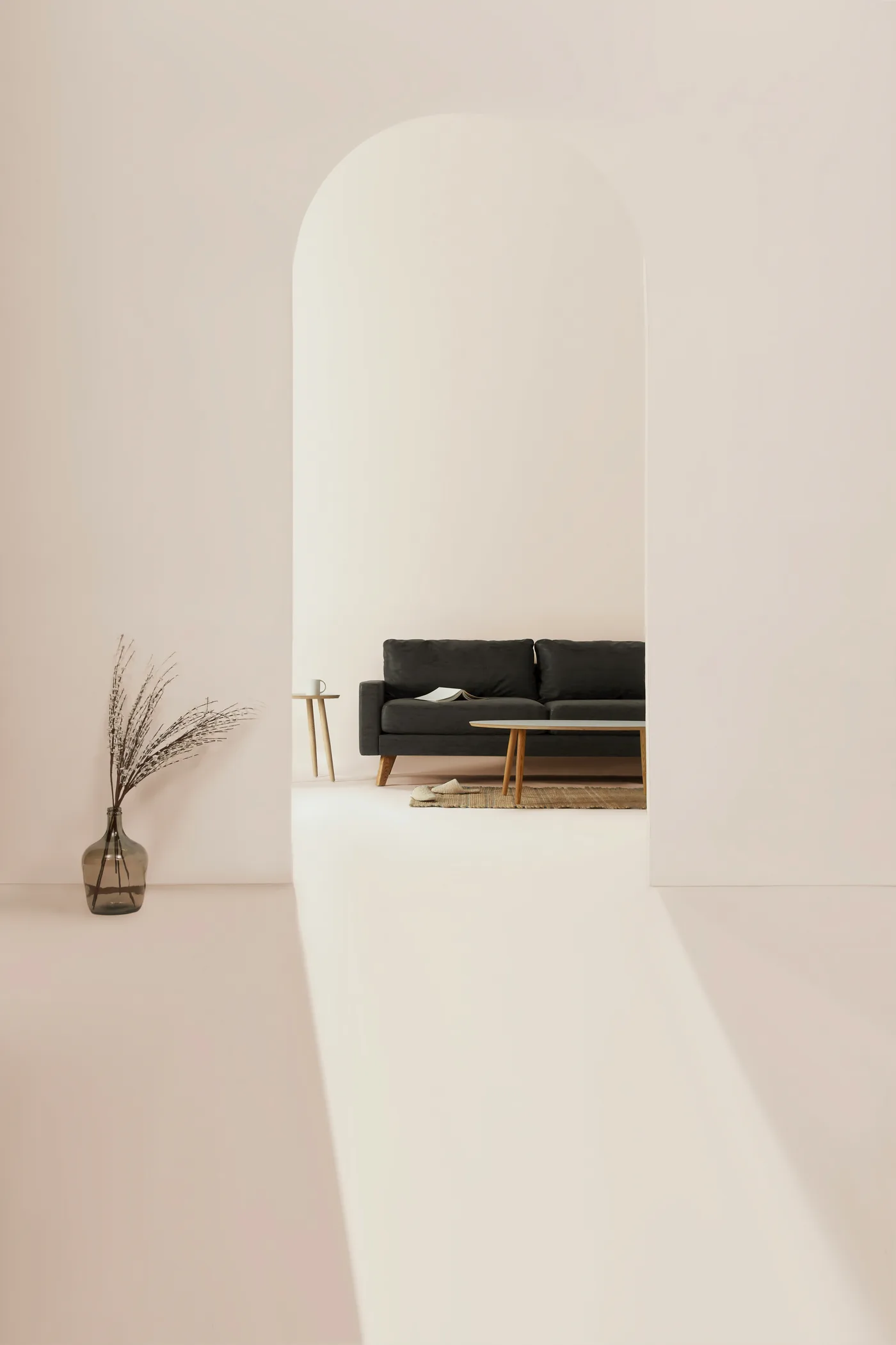 Salon aux murs beiges et au mobilier neutre