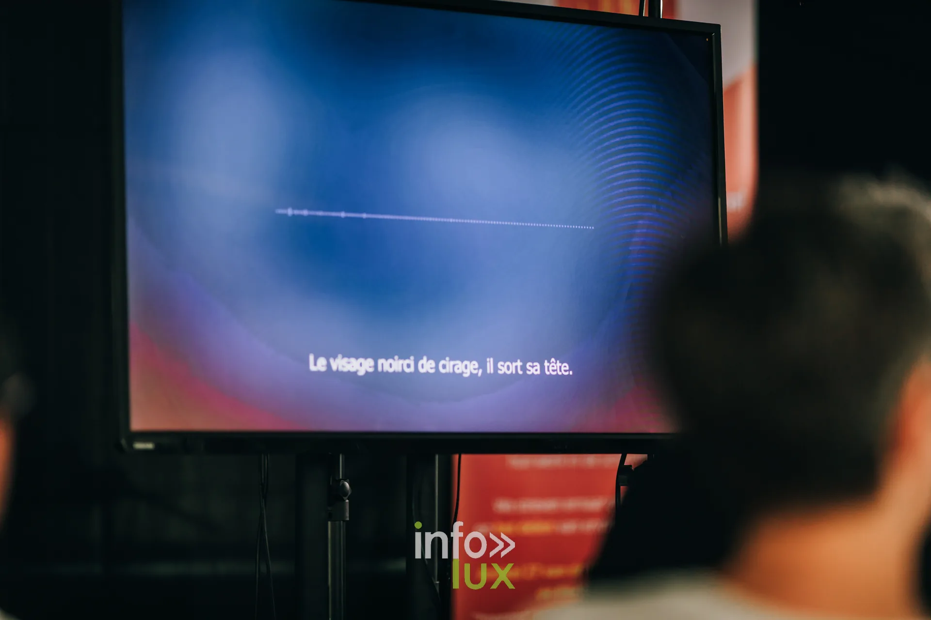 Ecran affichant les sous-titres d un documentaire audio pendant PodBXL 2026