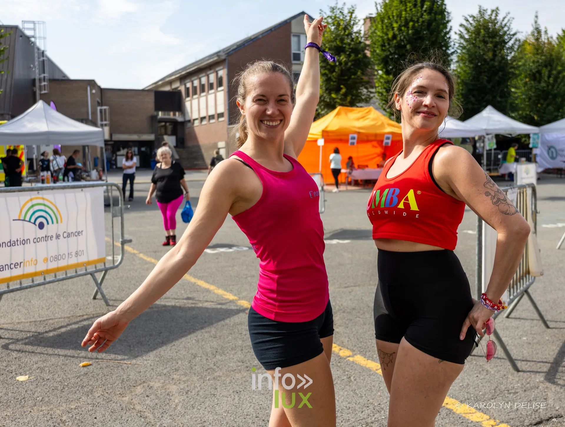 Stand et animatrices de zumba au village du Relais, Relais pour la Vie de Nivelles 2026