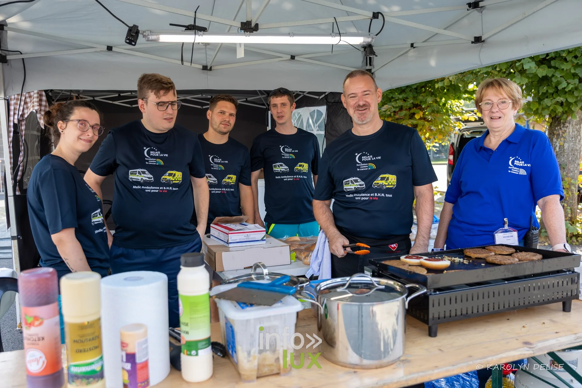 Bénévoles au stand de restauration du village, Relais pour la Vie de Nivelles 2026