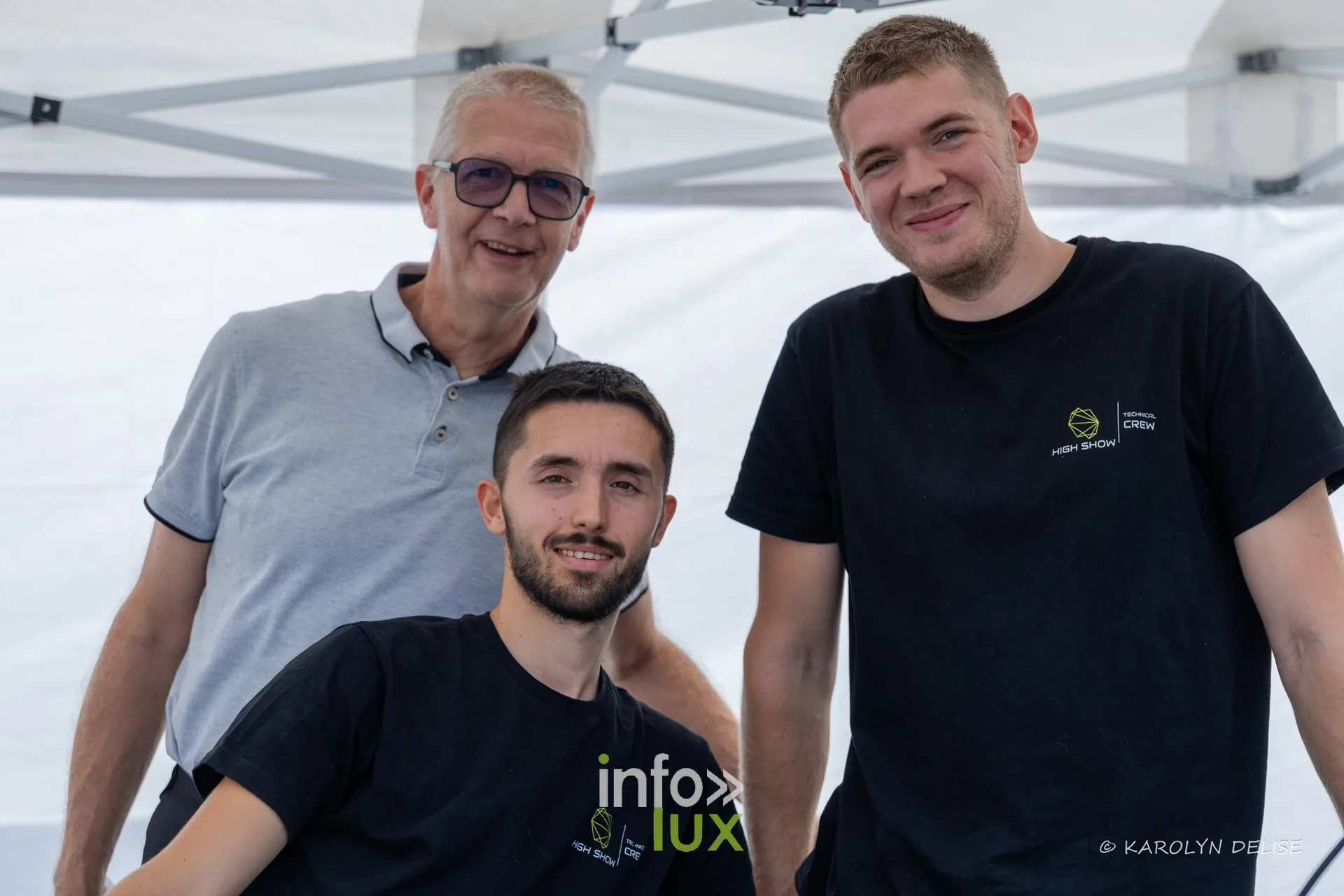 Trois participants sous une tente du village, Relais pour la Vie de Nivelles 2026
