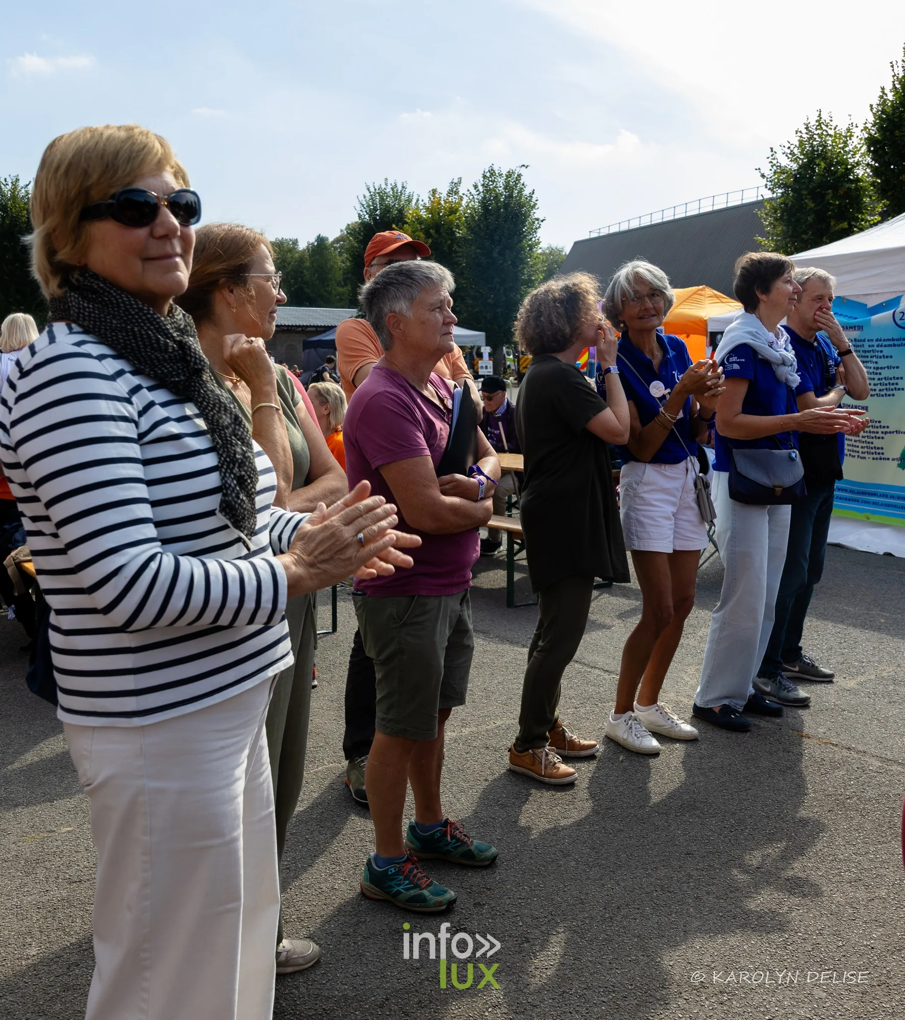 Chanteuses de la chorale et public, cérémonie de clôture, Relais pour la Vie de Nivelles 2026