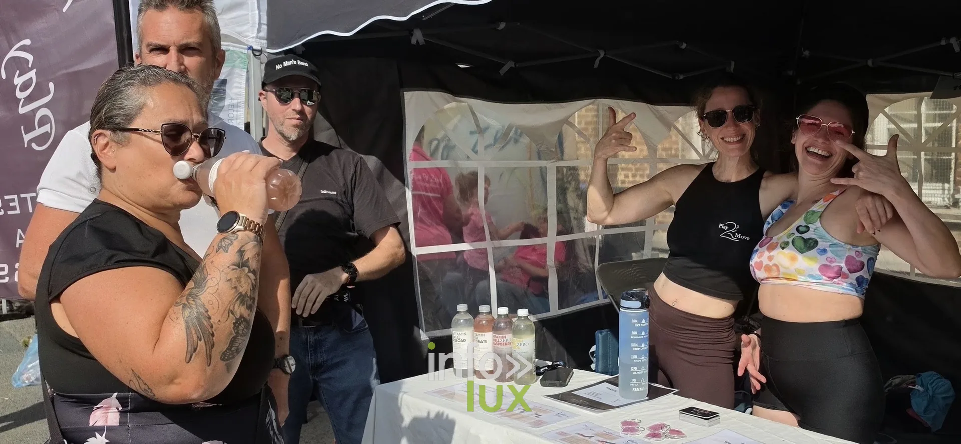Animatrices au stand du village, Relais pour la Vie de Nivelles 2026