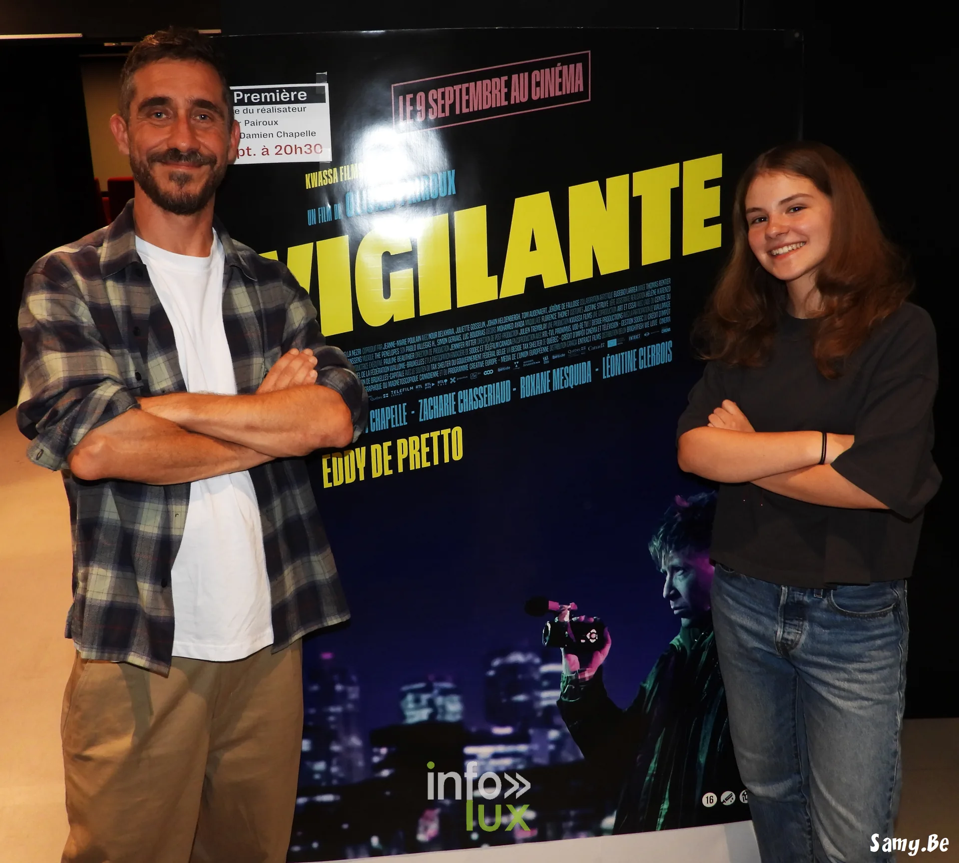 Olivier Pairoux et Léontine Clerbois devant l'affiche de Vigilante au Plaza Art