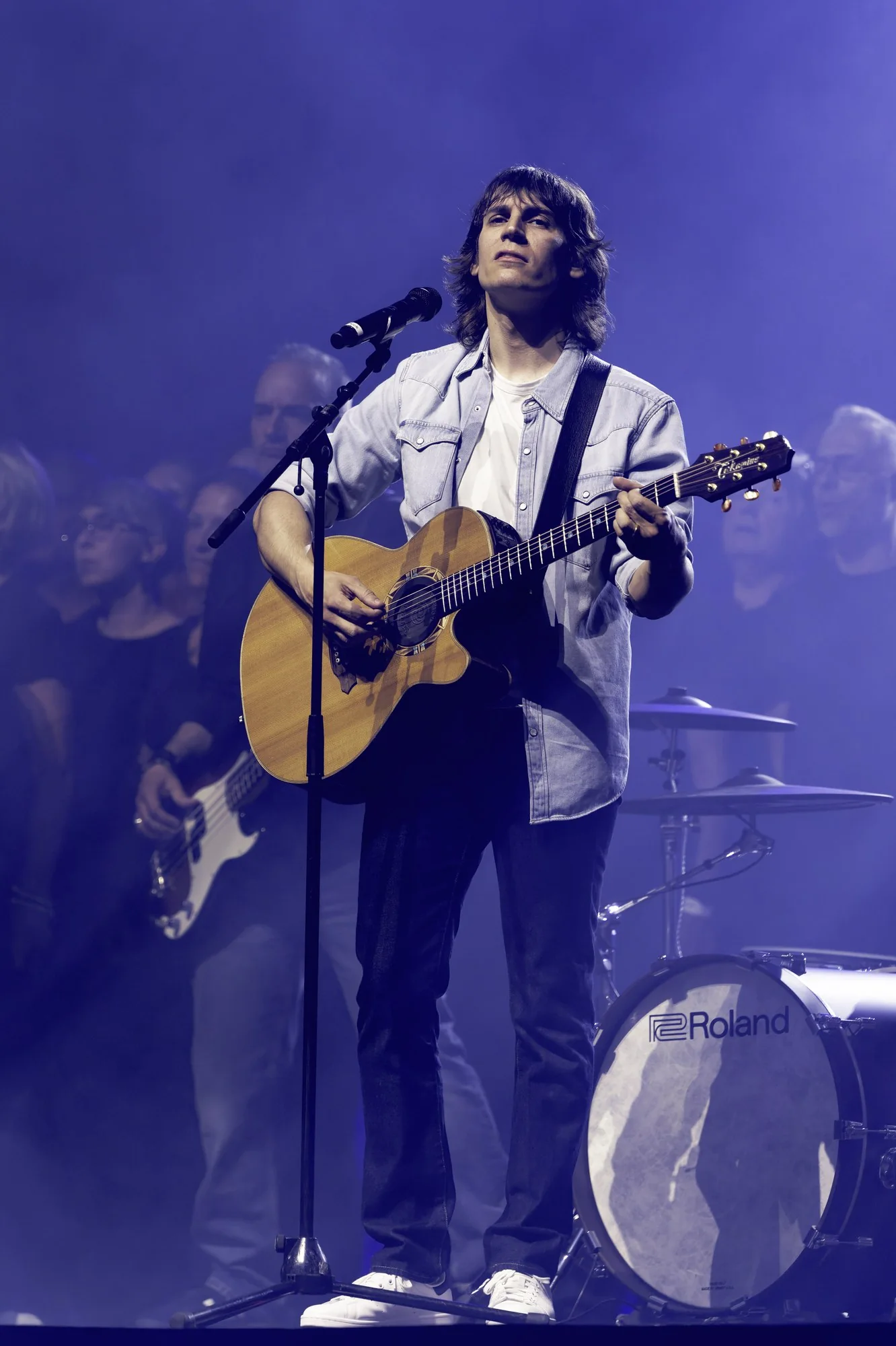 Flo Gallo et le chœur Voices Harmony sur scène lors d’un précédent spectacle